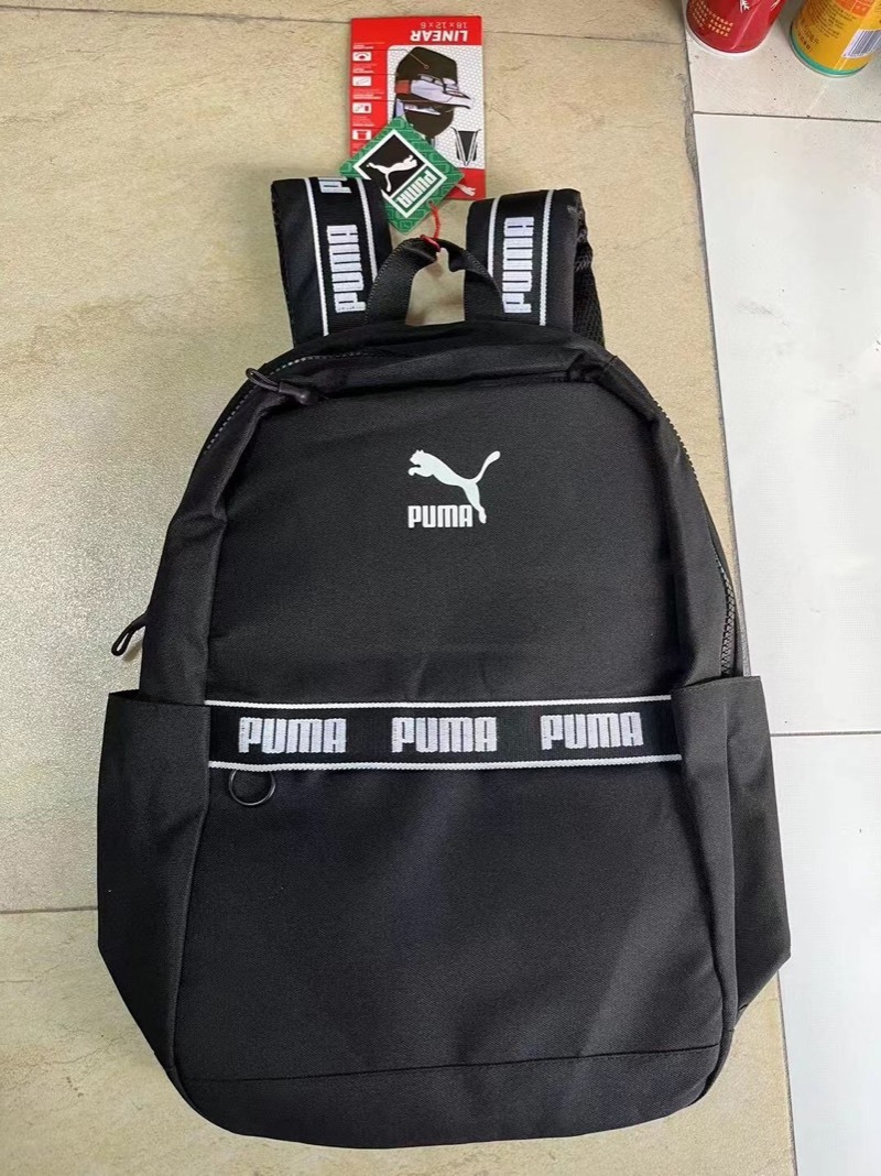 原单puma男女休闲运动双肩包,黑色 粉色两个颜色～尺寸:44*30*14cm